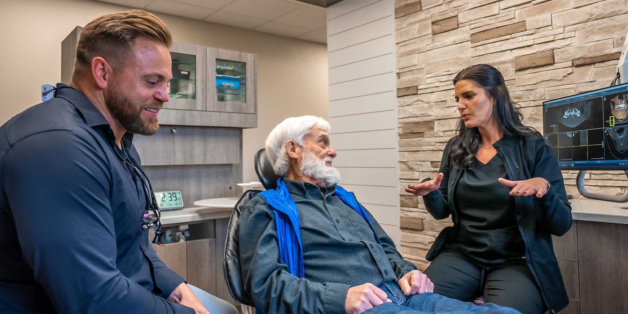 doctor talking to patient about teeth whitening options